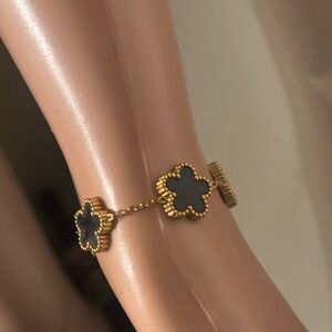 Elegant Gold and Black Flower Bracelet
